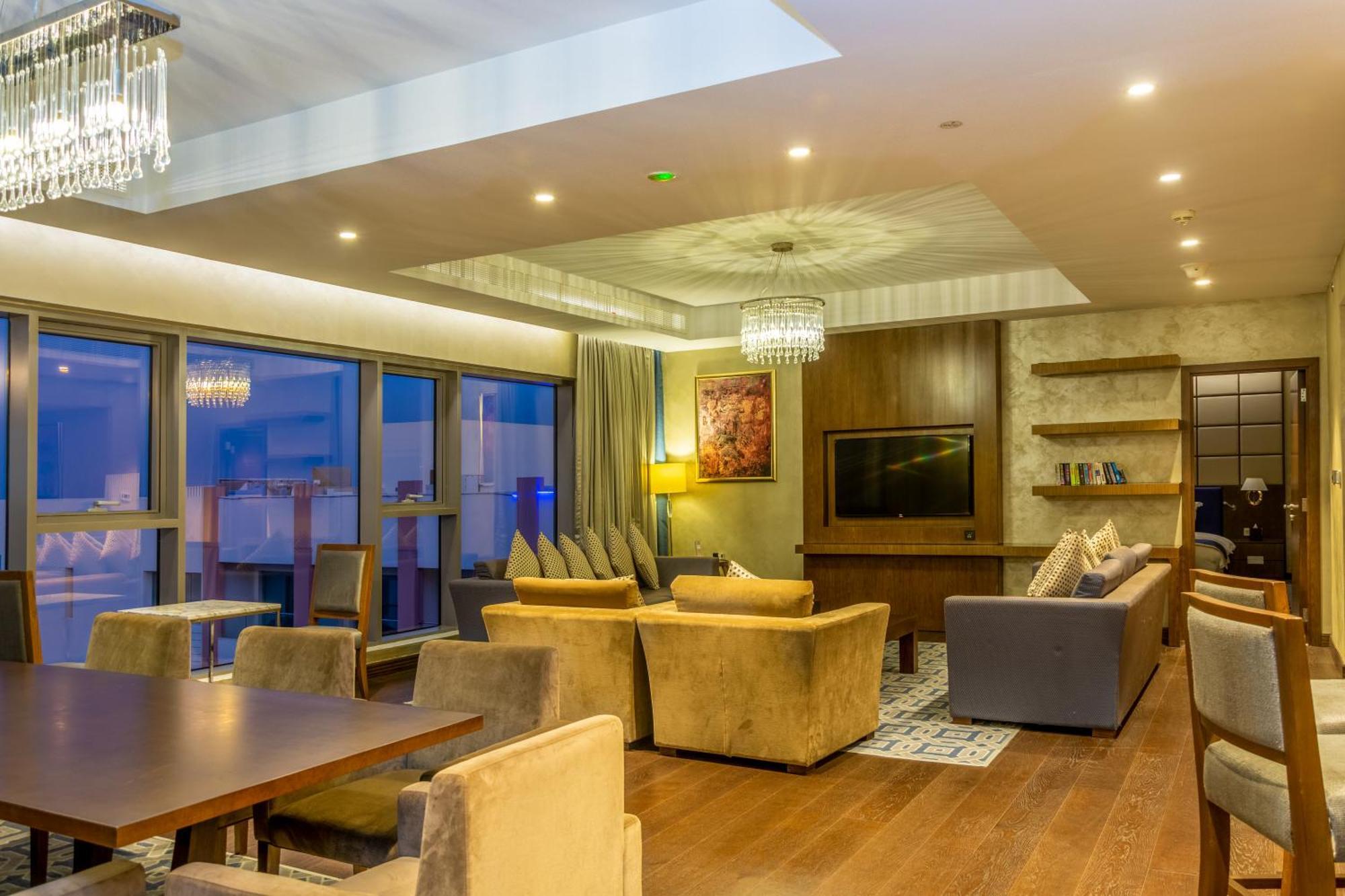 Radisson Blu Hotel & Resort, Sohar Extérieur photo The lounge at Kilimanjaro International Airport
